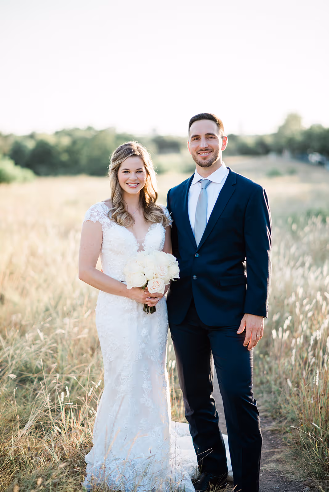 a man and woman in a field