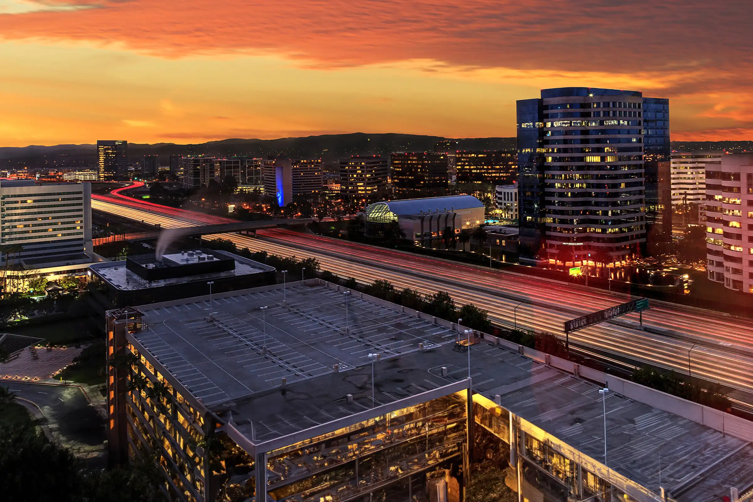Plumber performing tankless water heater installation in an Irvine home.