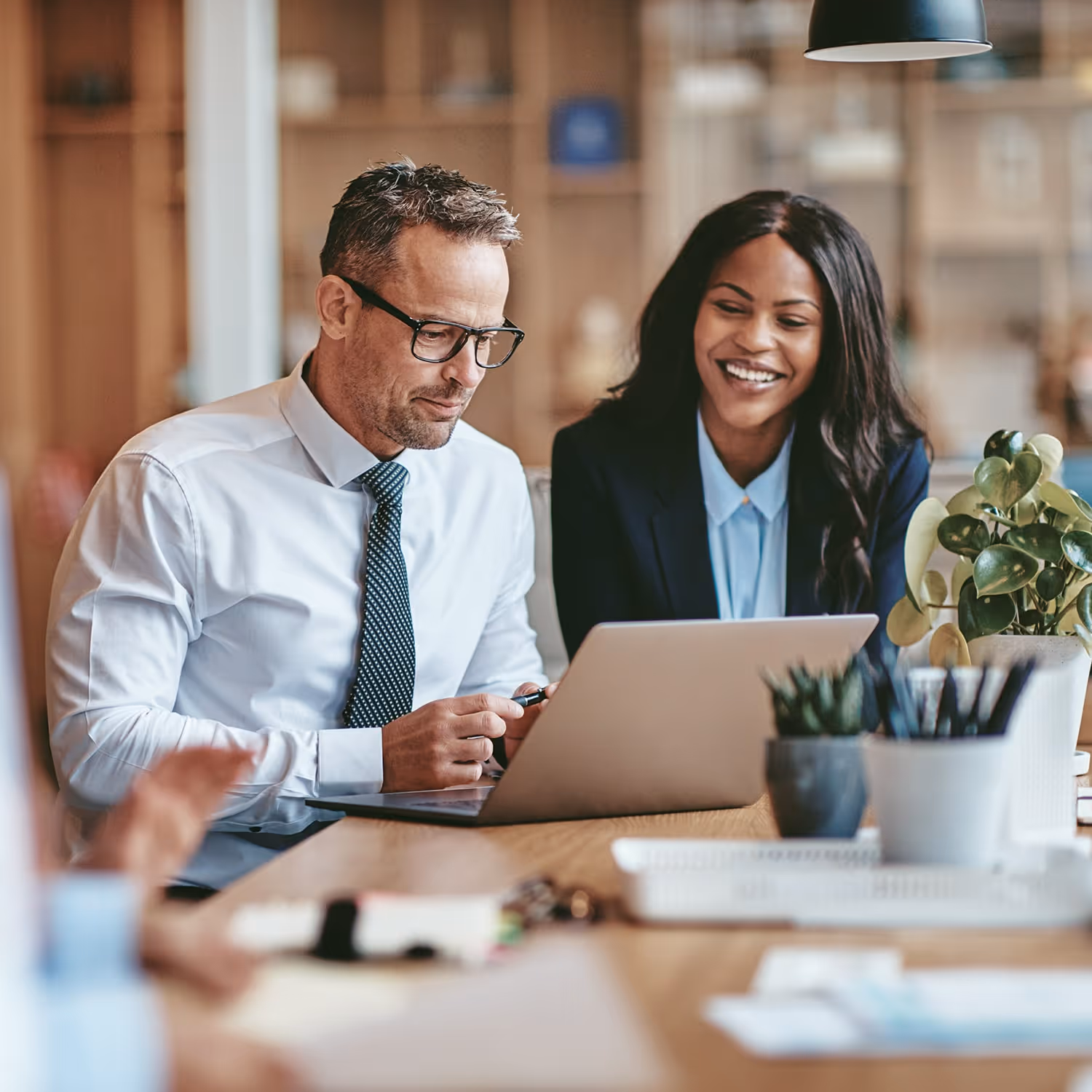 Two internal communicators raving about their internal email analytics through Broadcast.