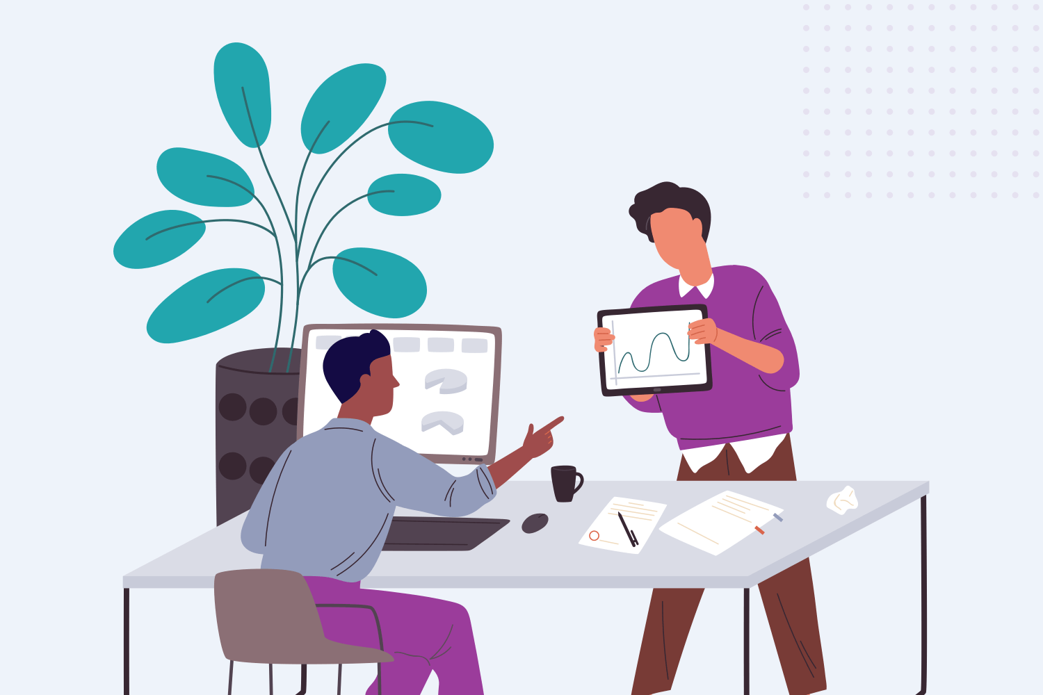 Internal communications employees discussing data graphic 