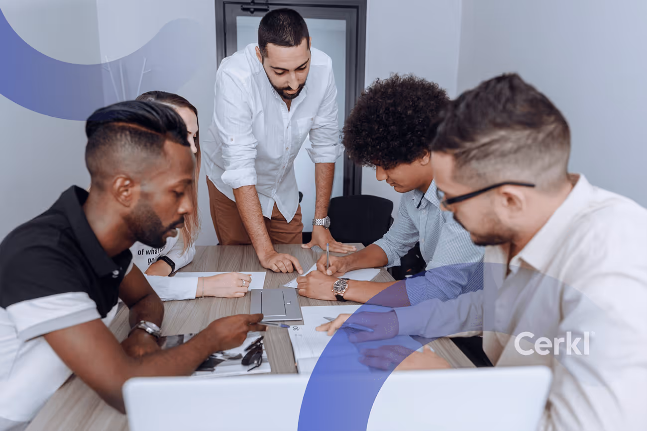 Internal communications leader reviewing employee engagement and productivity framework and strategy notes in a team meeting