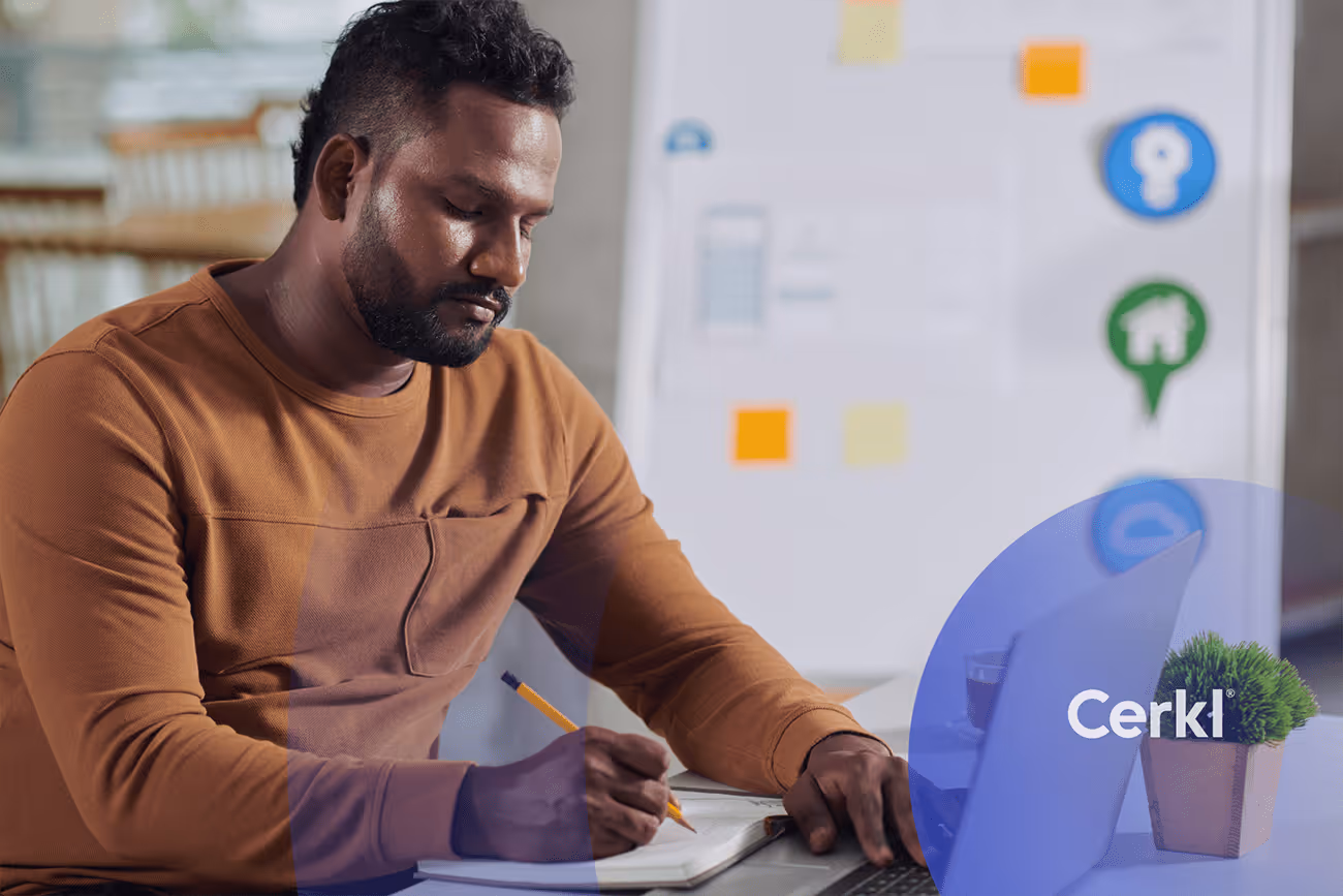 Internal communications leader reviewing employee performance goals framework and strategy notes in a team meeting