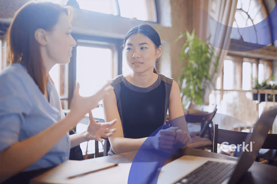 Internal communications leader reviewing horizontal communication framework and strategy notes in a team meeting