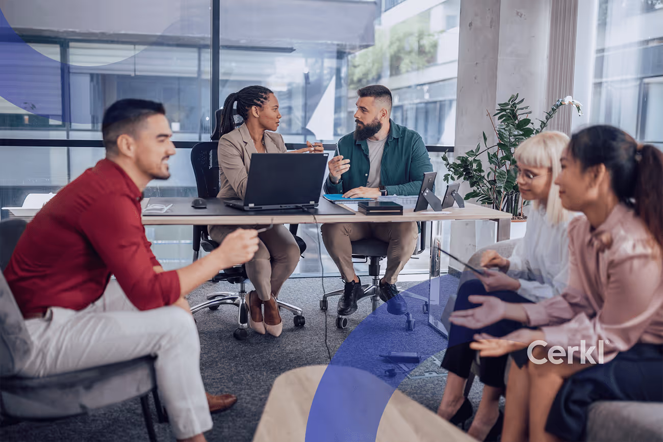 Internal communications leader reviewing interpersonal communication in the workplace framework and strategy notes in a team meeting
