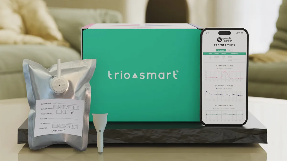 Trio-Smart breath test, collection bag, and mouthpiece with results displayed on a smartphone.