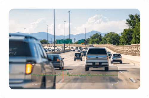 Traffic on a highway with vehicles driving in multiple lanes.