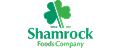 Green shamrock icon above the text 'Shamrock Foods Company' in green font.