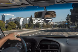 Netradyne dash cam inside vehicle while driver is driving on the road