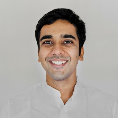 Portrait headshot of Harsha Balakrishnan.