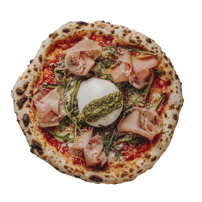 Neapolitan pizza topped with tomato sauce, arugula, thin slices of cured meat, a ball of burrata cheese, and a dollop of green pesto.