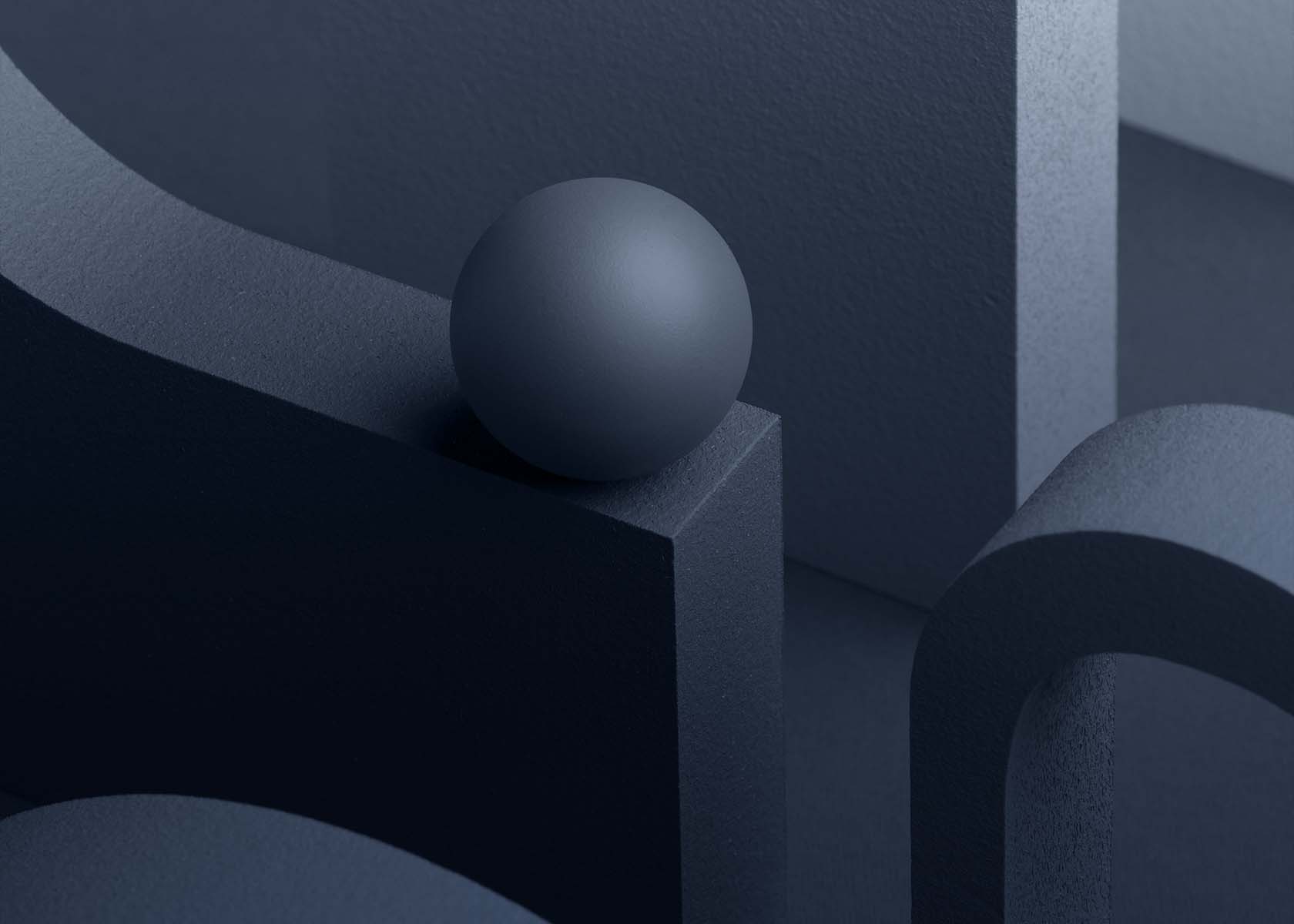 Matte textured blue sphere resting on a rectangular block among abstract curved and rectangular forms.