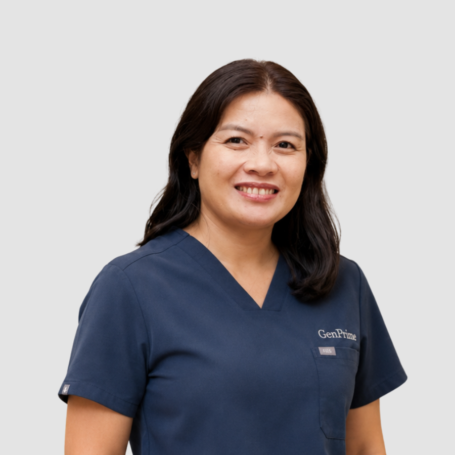 Esther Viclyn A. Duque, IVF nurse at GenPrime Philippines, wearing navy-blue medical scrubs.