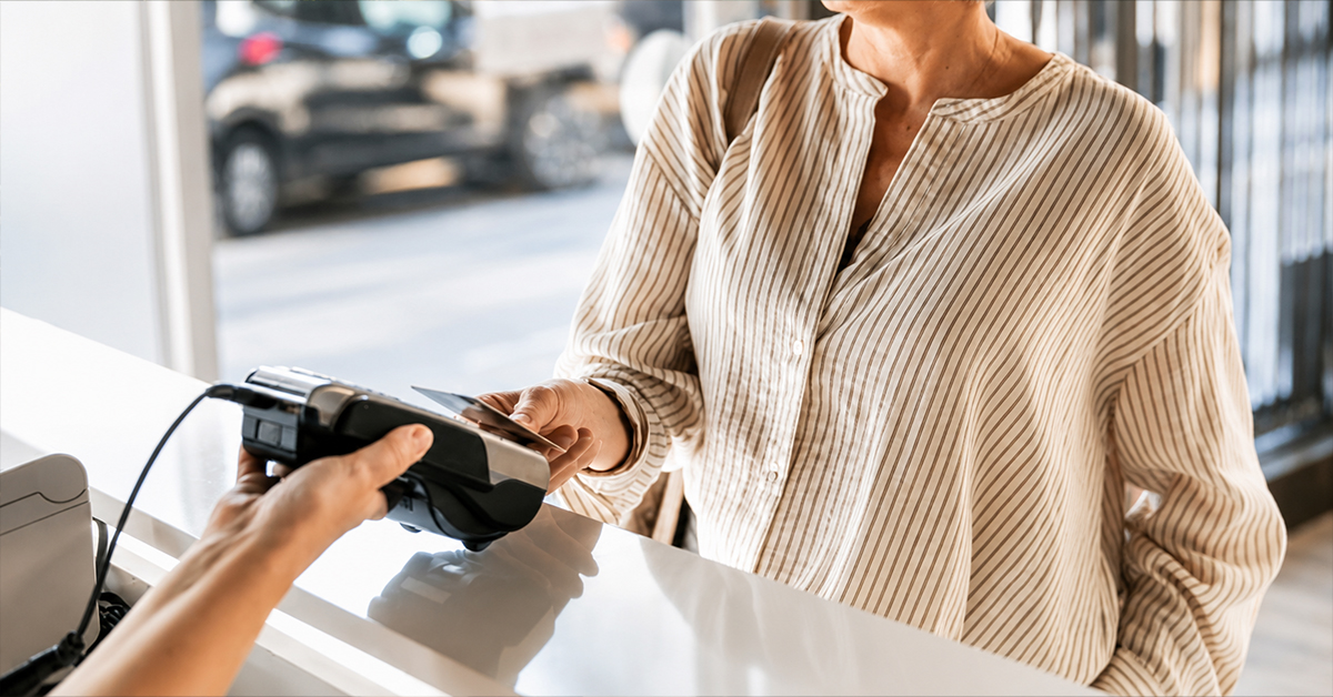 Patient making a card payment for healthcare or fertility treatment expenses