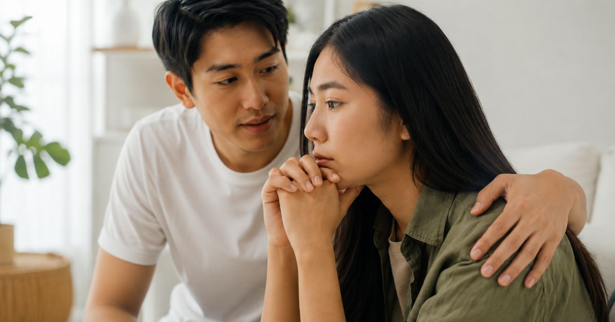 Couple communicating about how they're each coping with fertility treatment