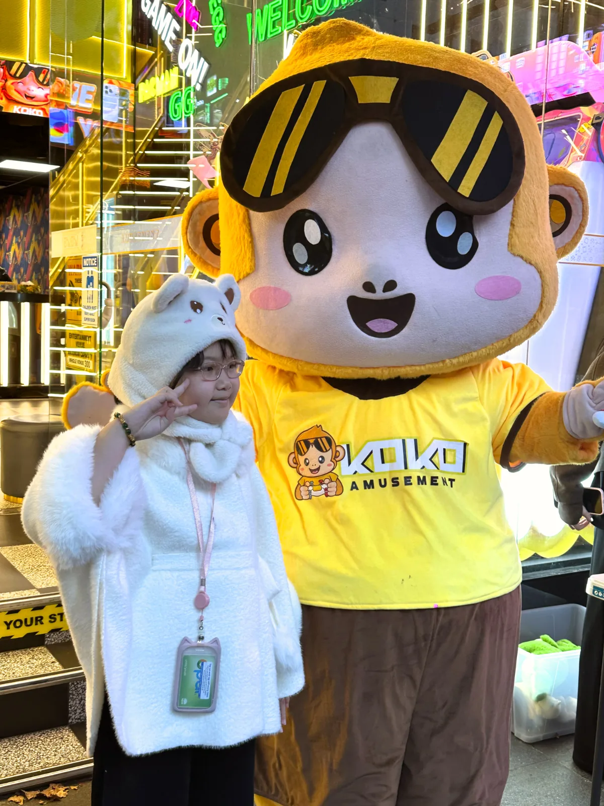 George the KOKO Amusement mascot posing with visitors