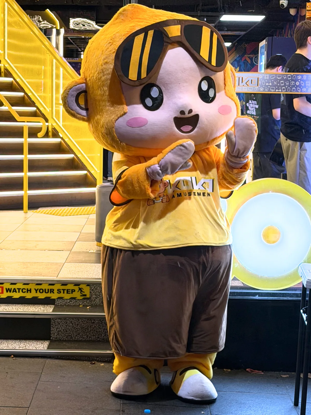 George the KOKO Amusement mascot meeting guests on the arcade floor
