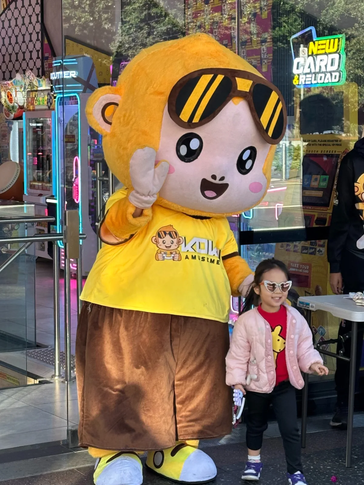 George the KOKO Amusement mascot posing for photos with guests