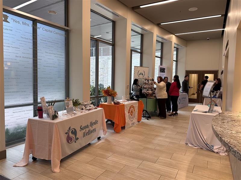 A photo of sponsors at the 3rd Annual Resilience & Recovery Conference of Fort Worth, including Sana Mente Wellness. The sponsors are promoting their practices and offering support and resources.