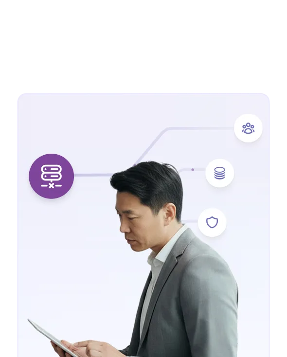 Man in gray suit using a tablet with floating icons representing people, database, and shield.