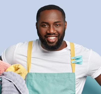 Young African American Man Doing Laundry