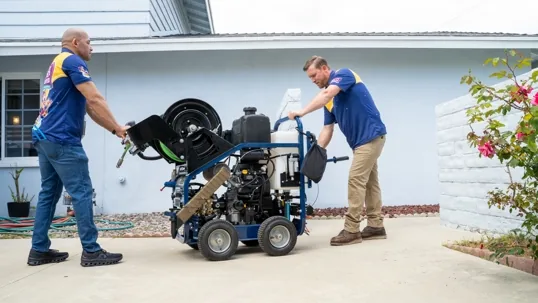 Licensed Wish Granted Plumbing technician performing eco-safe hydro jetting on residential sewer lin…