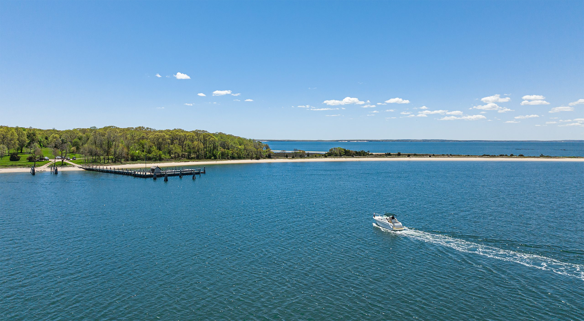 Charter yacht on the water in the Hamptons at sunset