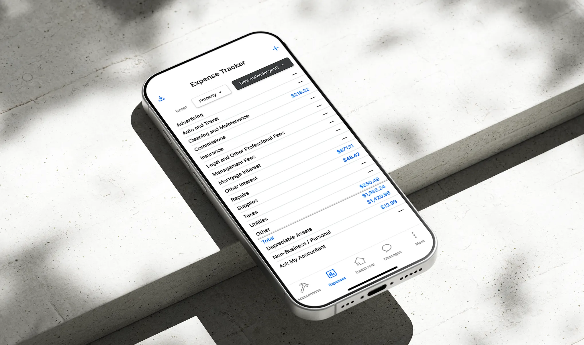 Mobile screen showing expense tracking dashboard for rental property finances