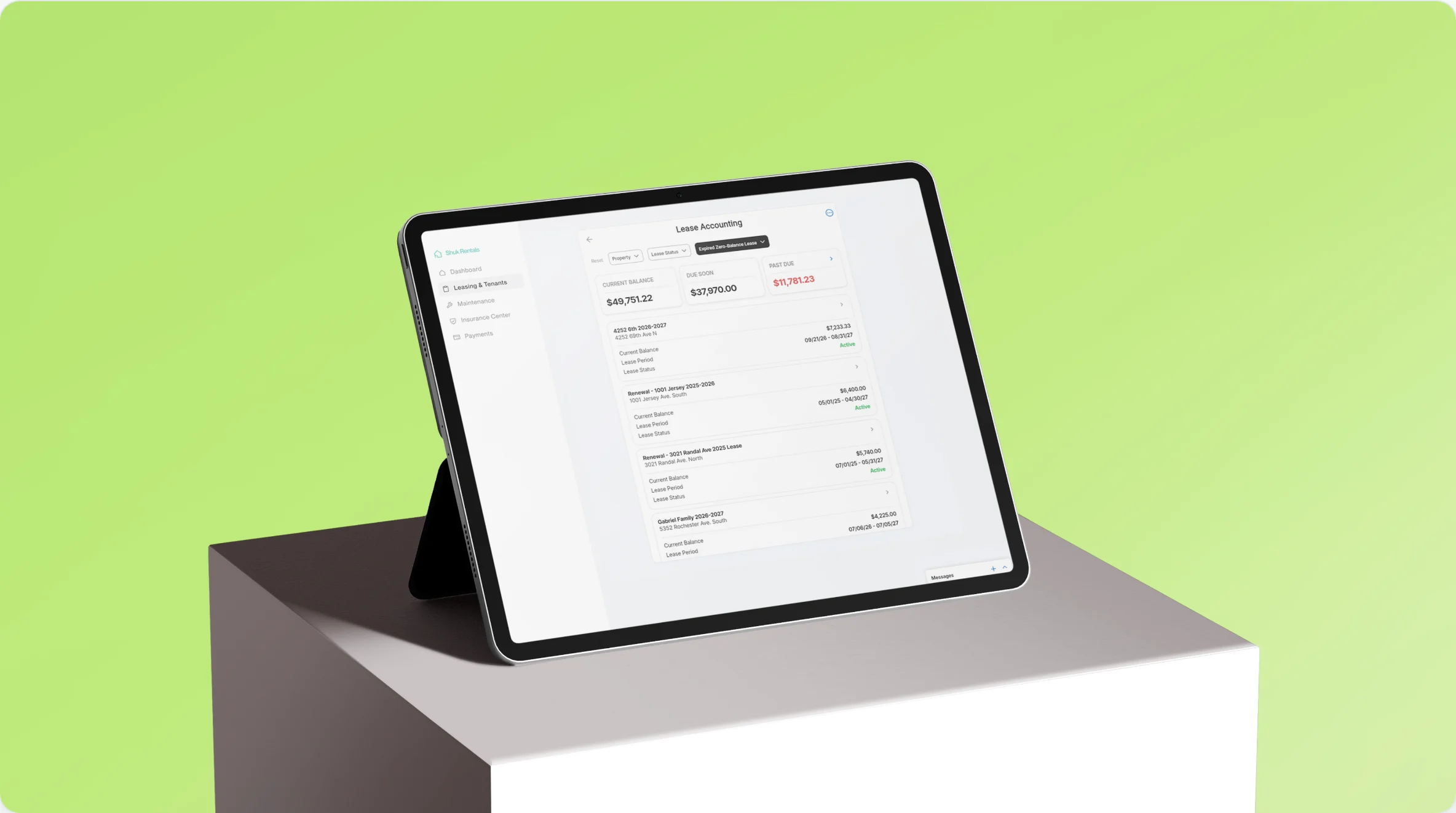 Product screenshot showing rent roll with auto-pay and partial payment states