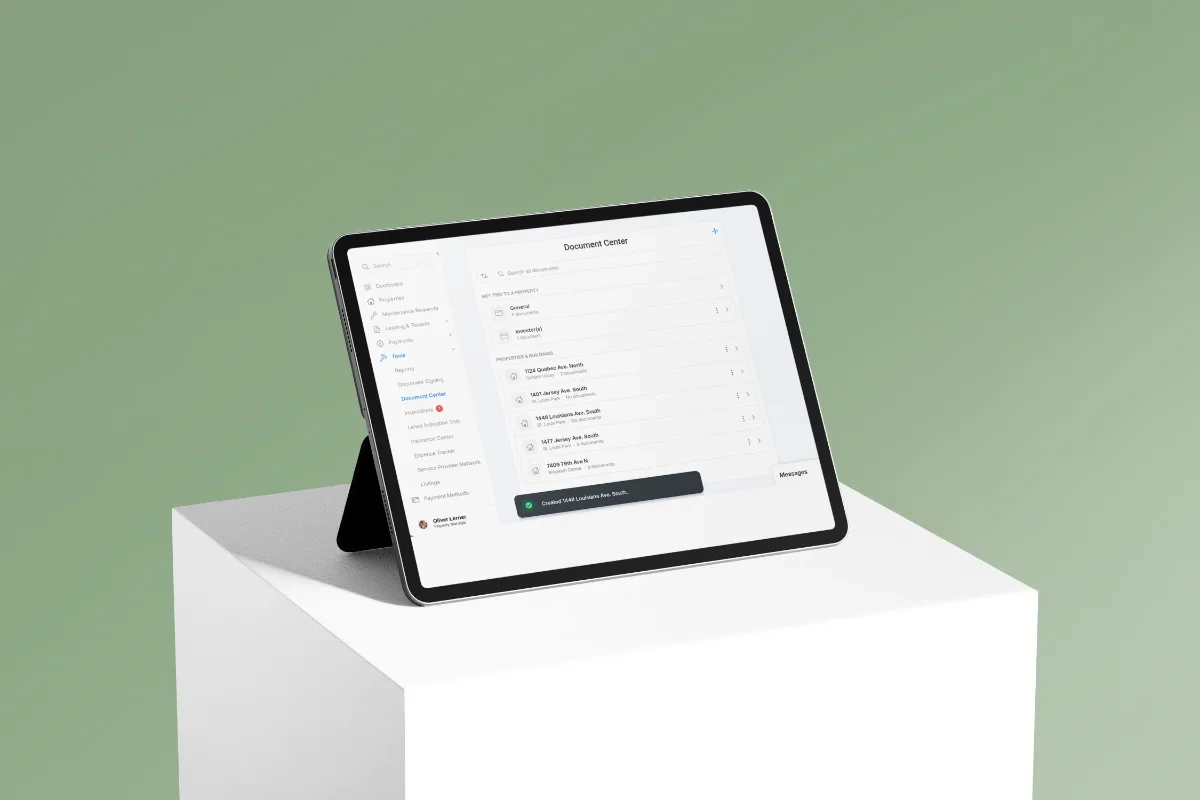 Shuk Document Center on a tablet, with General and property folders and a confirmation that a file was moved