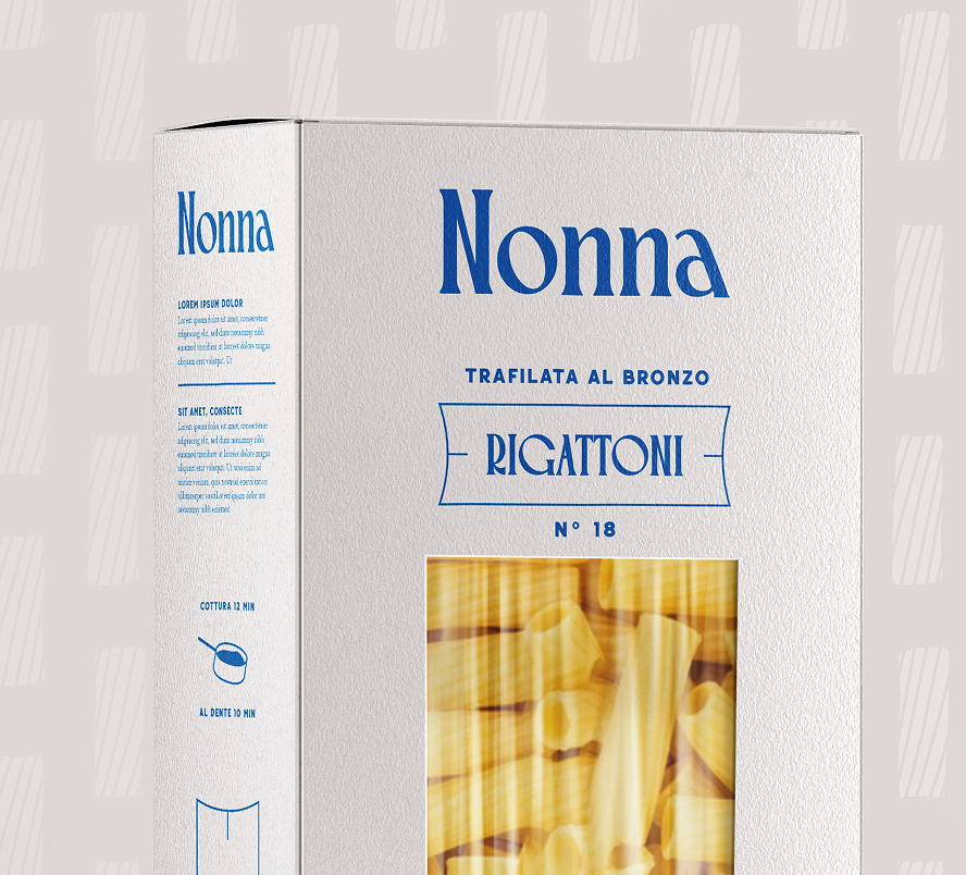 Boîte de pâtes Rigatoni Nonna, packaging blanc avec fenêtre montrant les pâtes.