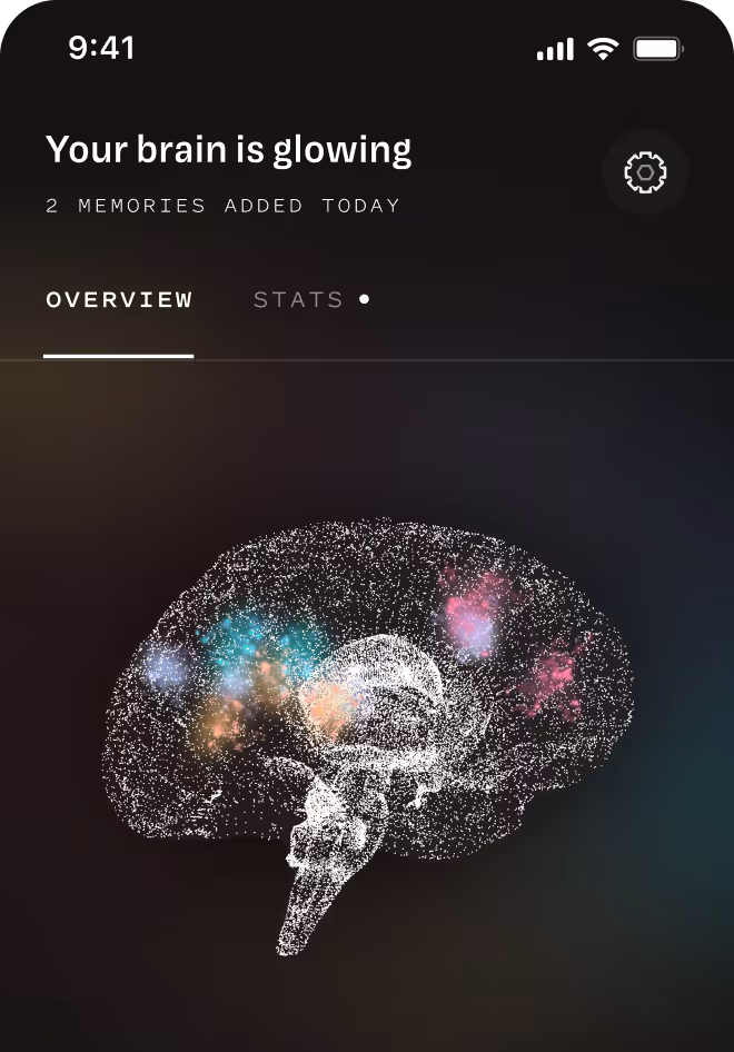 Mobile app screen showing a glowing digital brain with colorful spots and text reading 'Your brain is glowing' and '2 memories added today'.