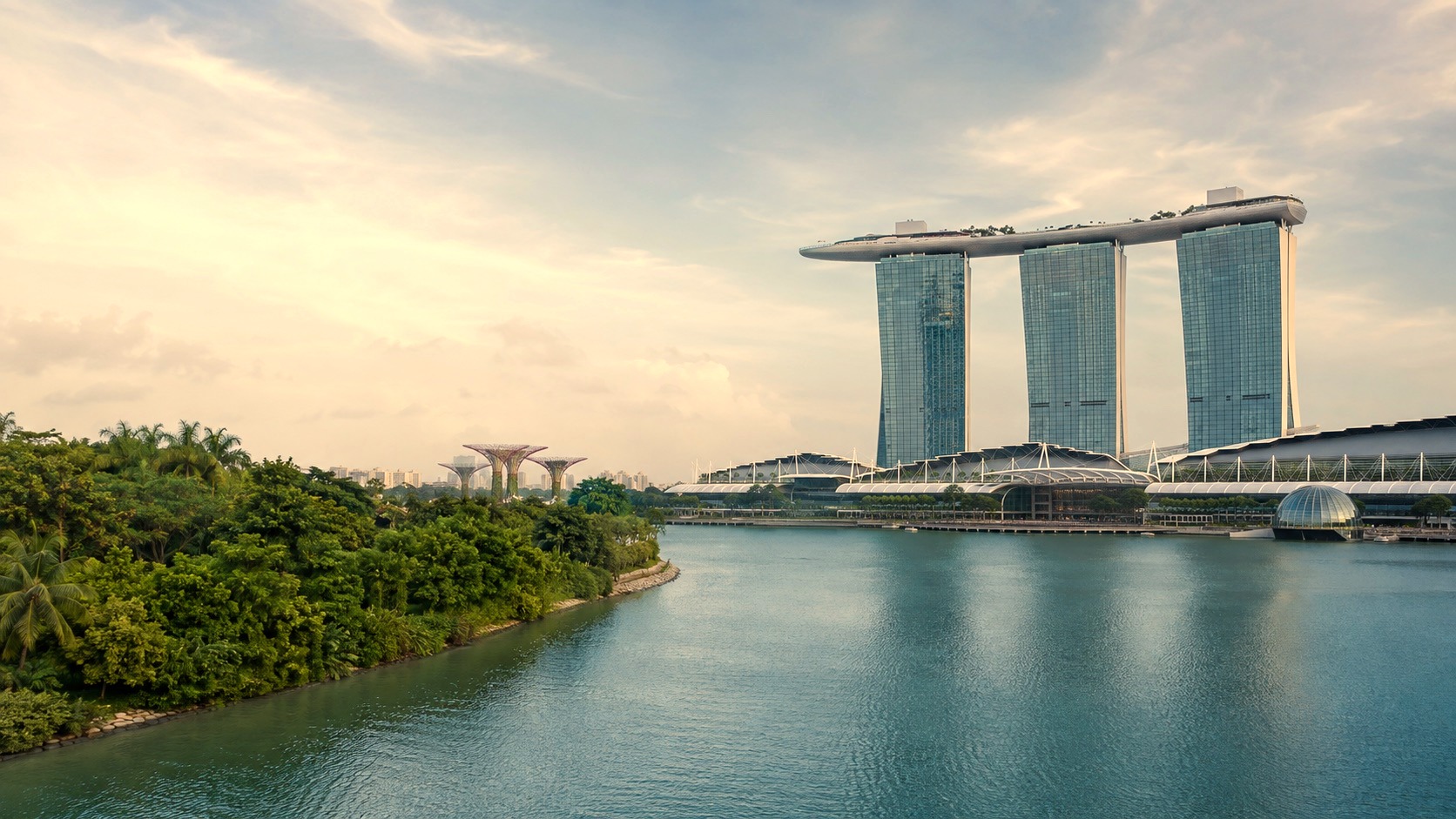 Marina Bay waterfront and Marina Bay Sands in Singapore in warm late light