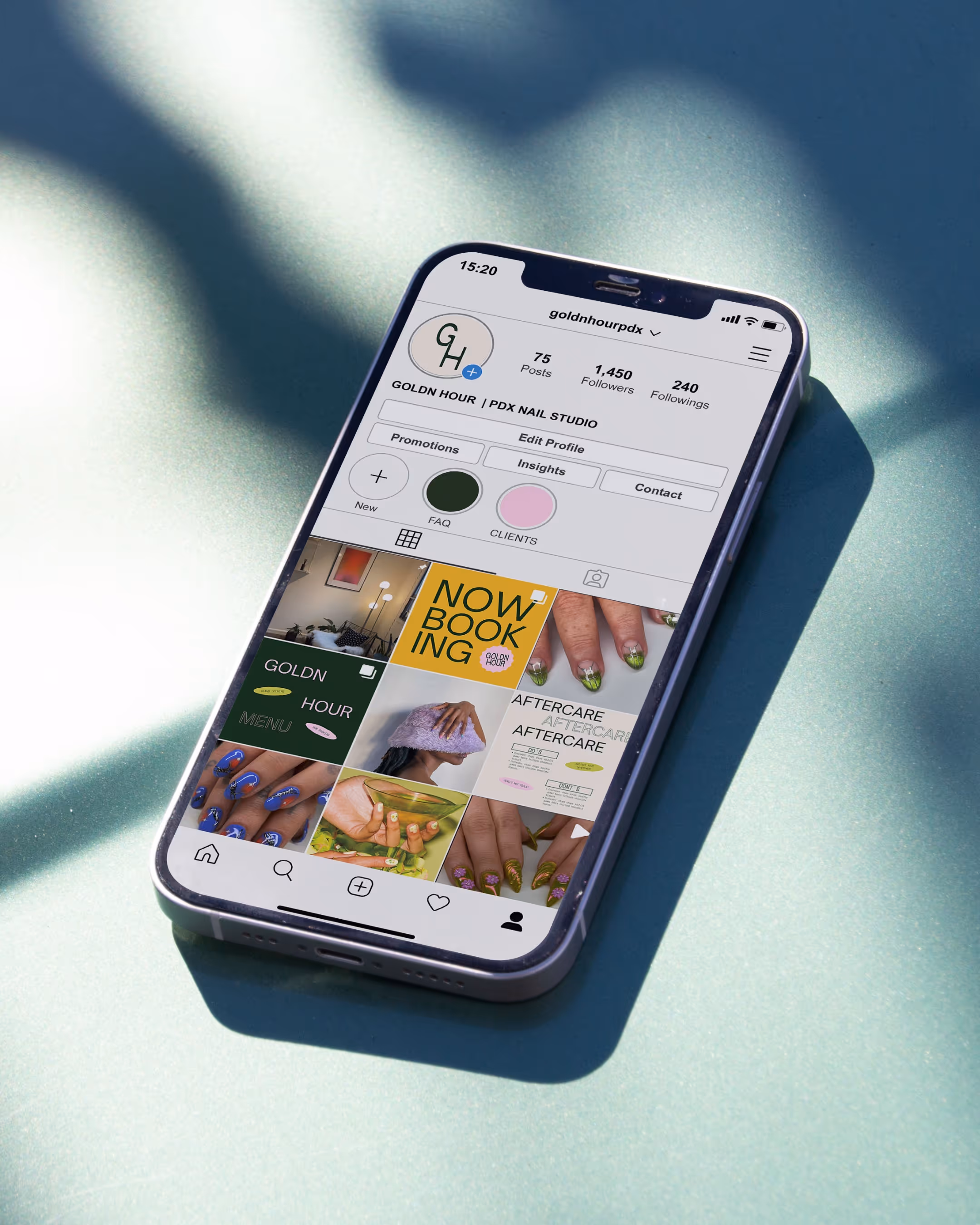 Smartphone displaying Instagram profile of GOLDN HOUR PDX Nail Studio with nail art photos and booking post.