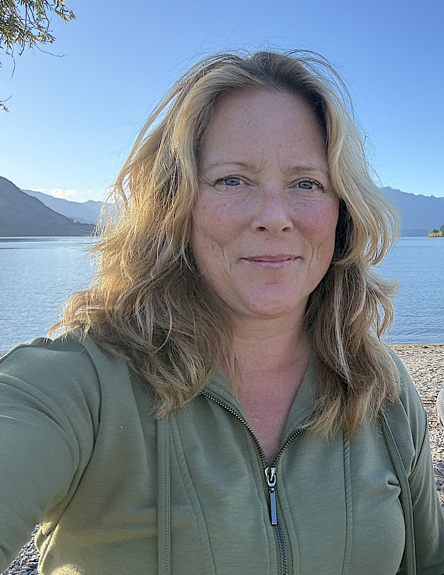 Private investigator Amy Wallace of AW Investigations takes a selfie while exploring the beautiful scenery in Wānaka, New Zealand.