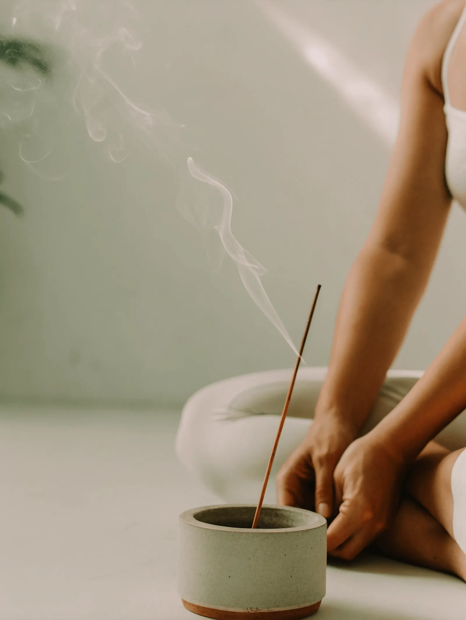 Hands holding yoga mat close-up