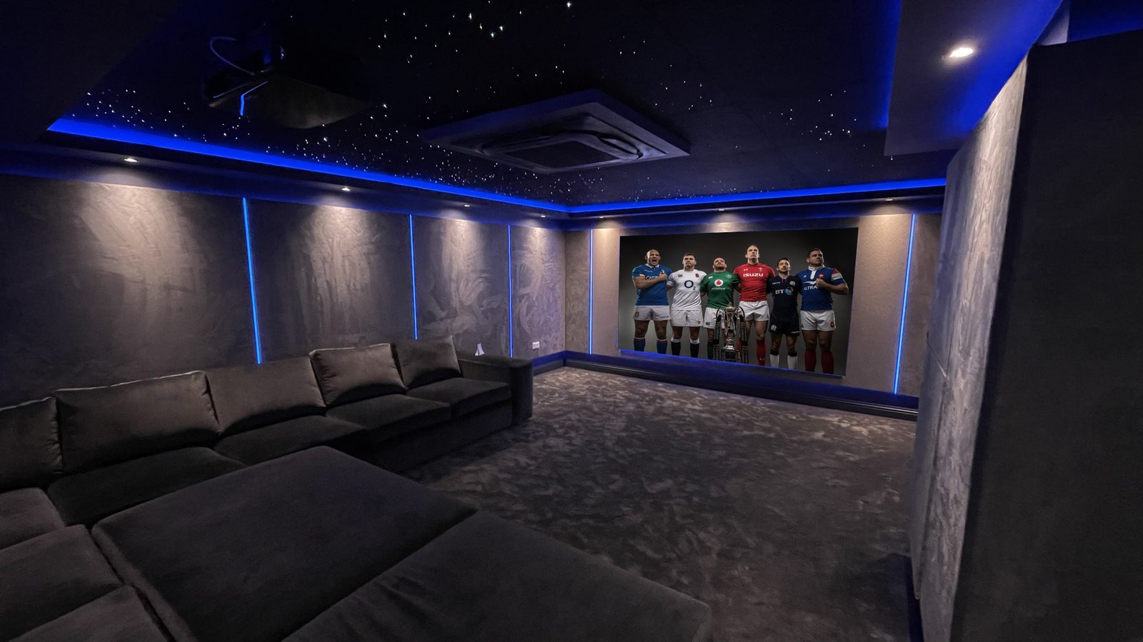 Basement home cinema screen showing Six Nations rugby coverage