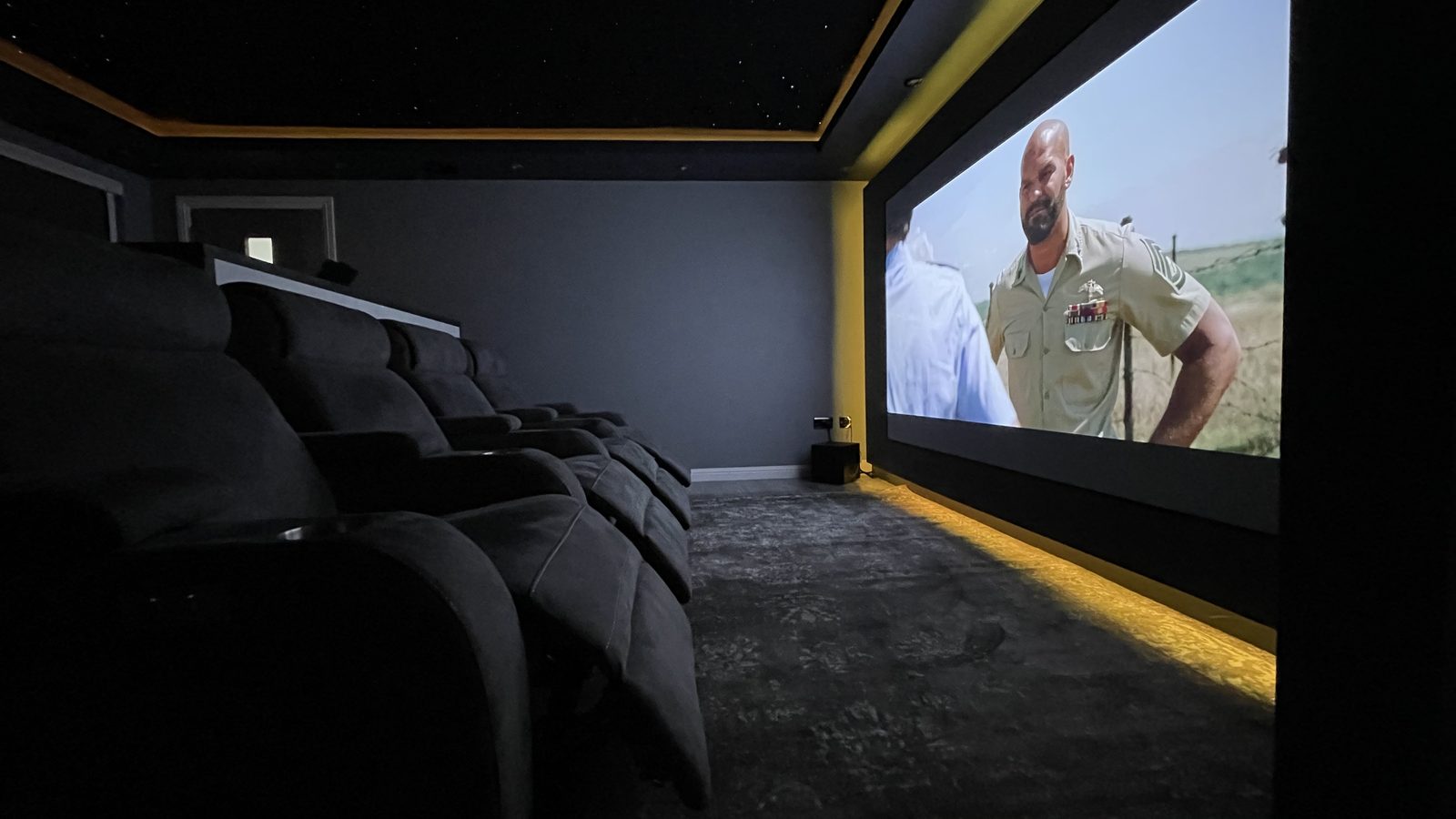 Finished Bishopton garage home cinema, screen wall
