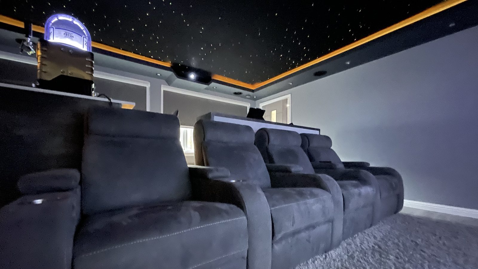 Finished Bishopton garage home cinema ceiling with star lighting