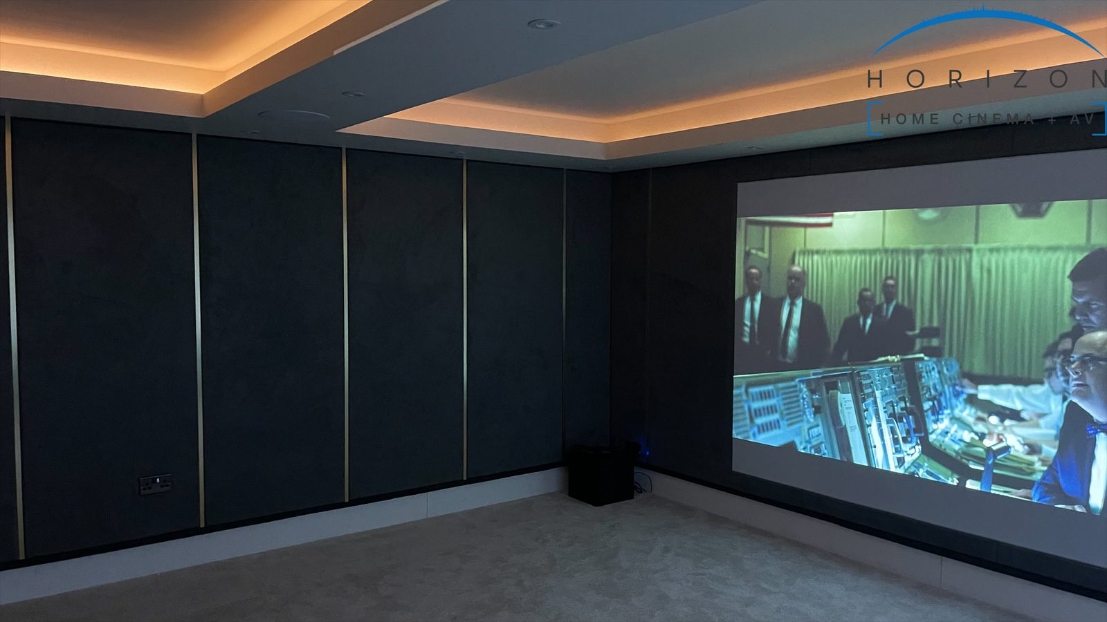 Finished Jackton garage cinema panelled walls and screen