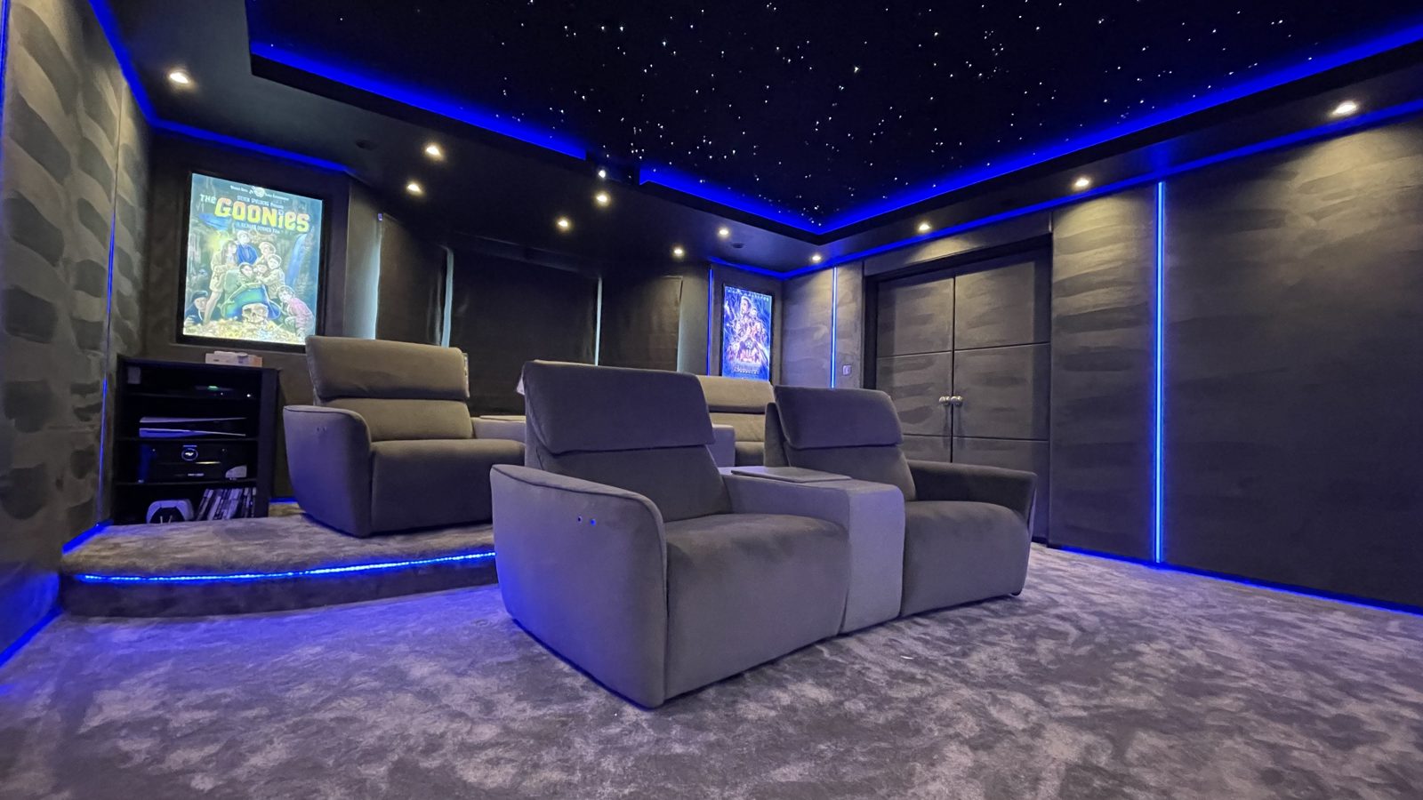 Finished dining room home cinema with recliners and star ceiling