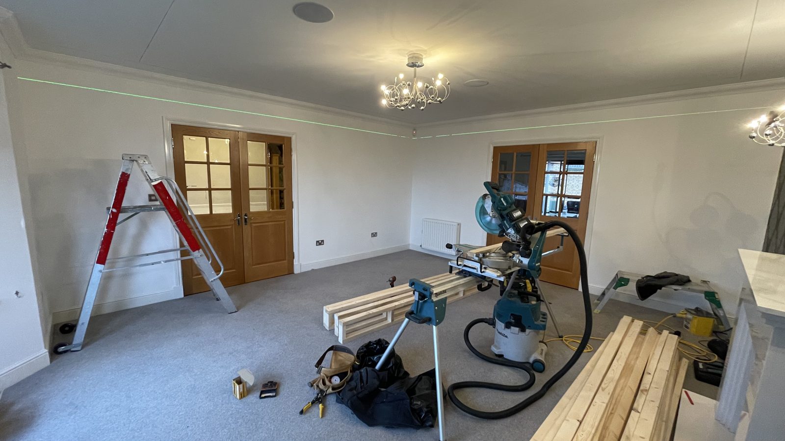 Dining room mid-construction before cinema conversion, wide view