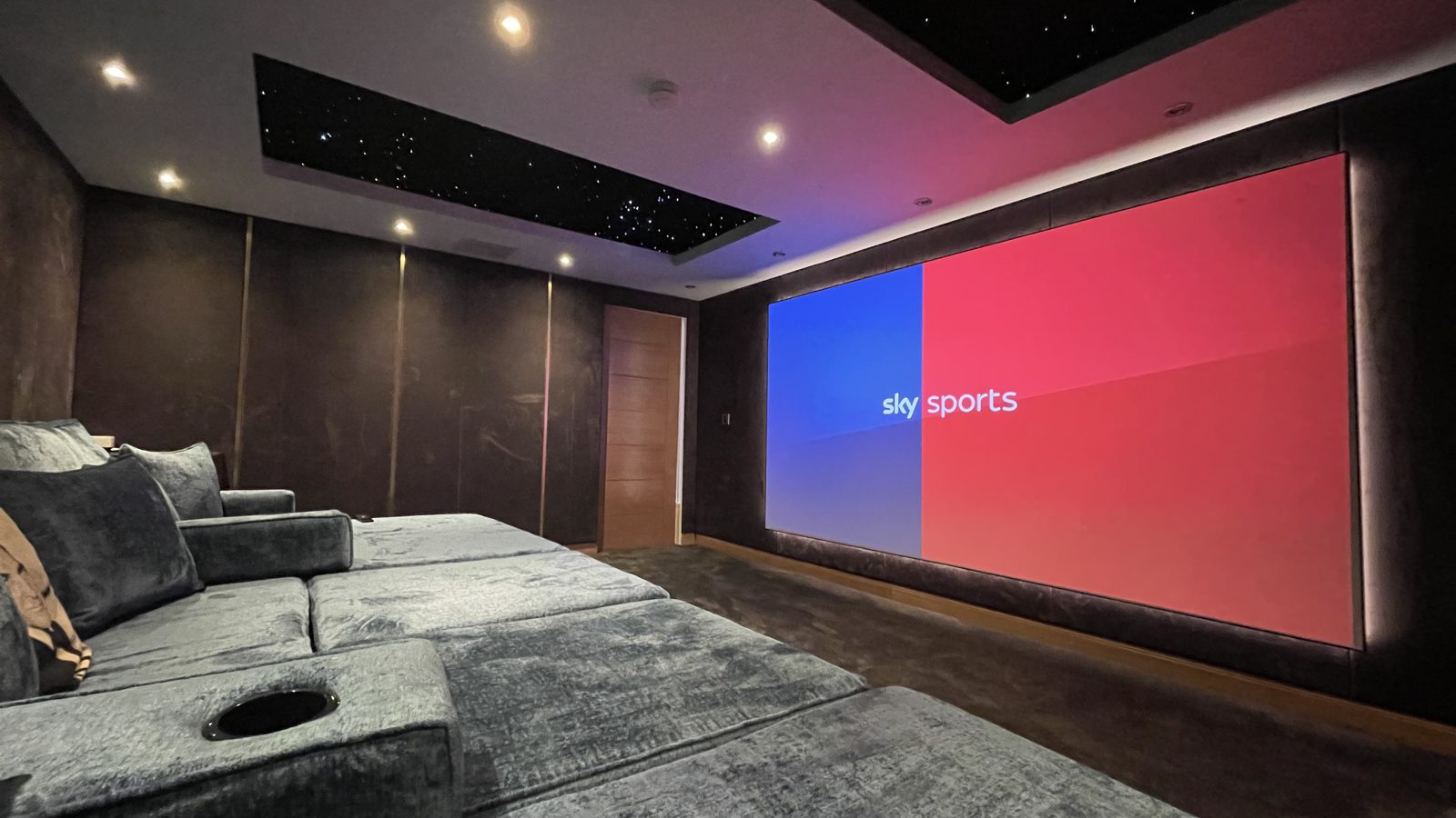 Rosebank spare room cinema screen showing Sky Sports