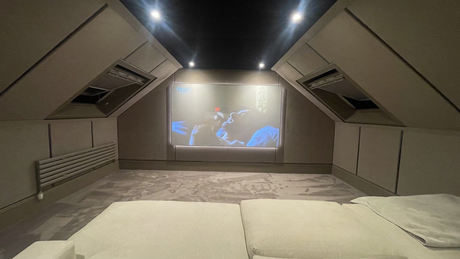 Finished Ayrshire attic home cinema, symmetric dual roof windows and centred screen