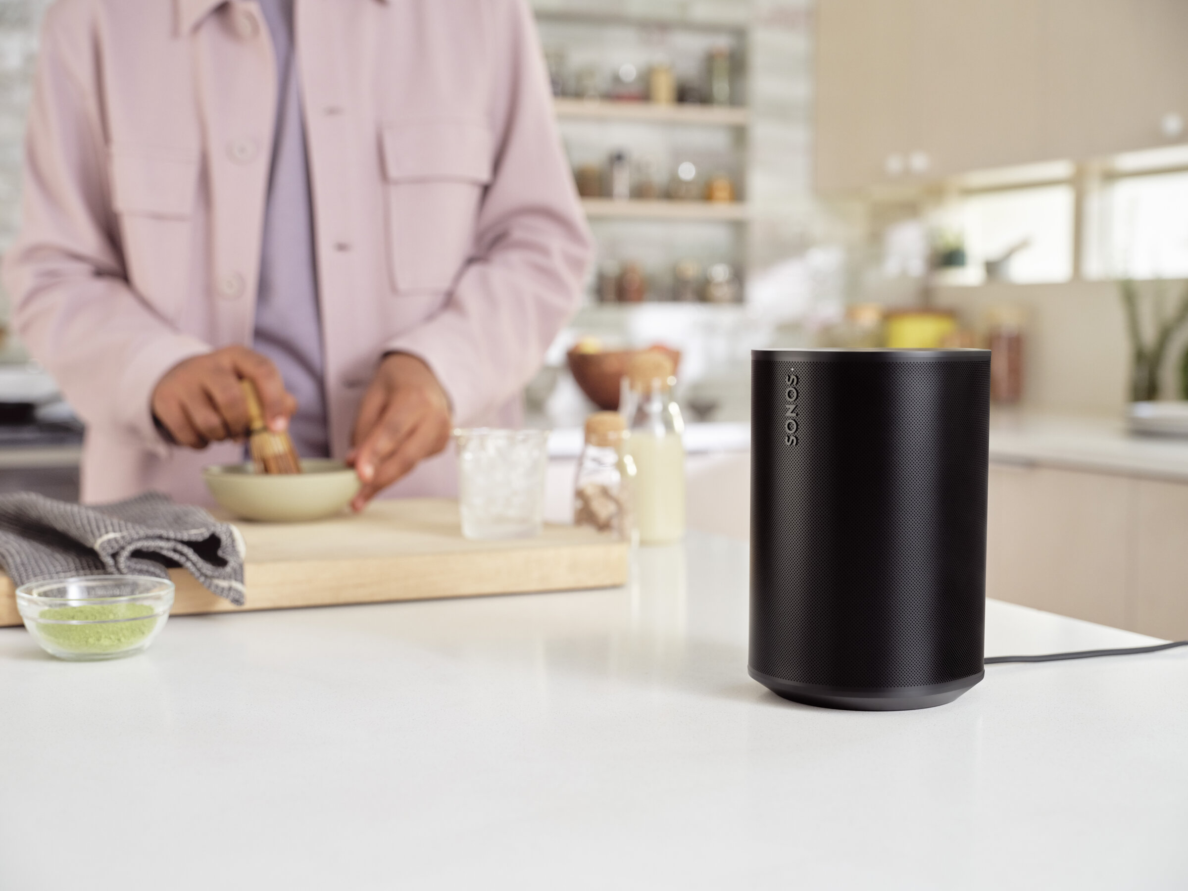 Multi-room audio playing in a bright kitchen, part of a whole-home audio installation