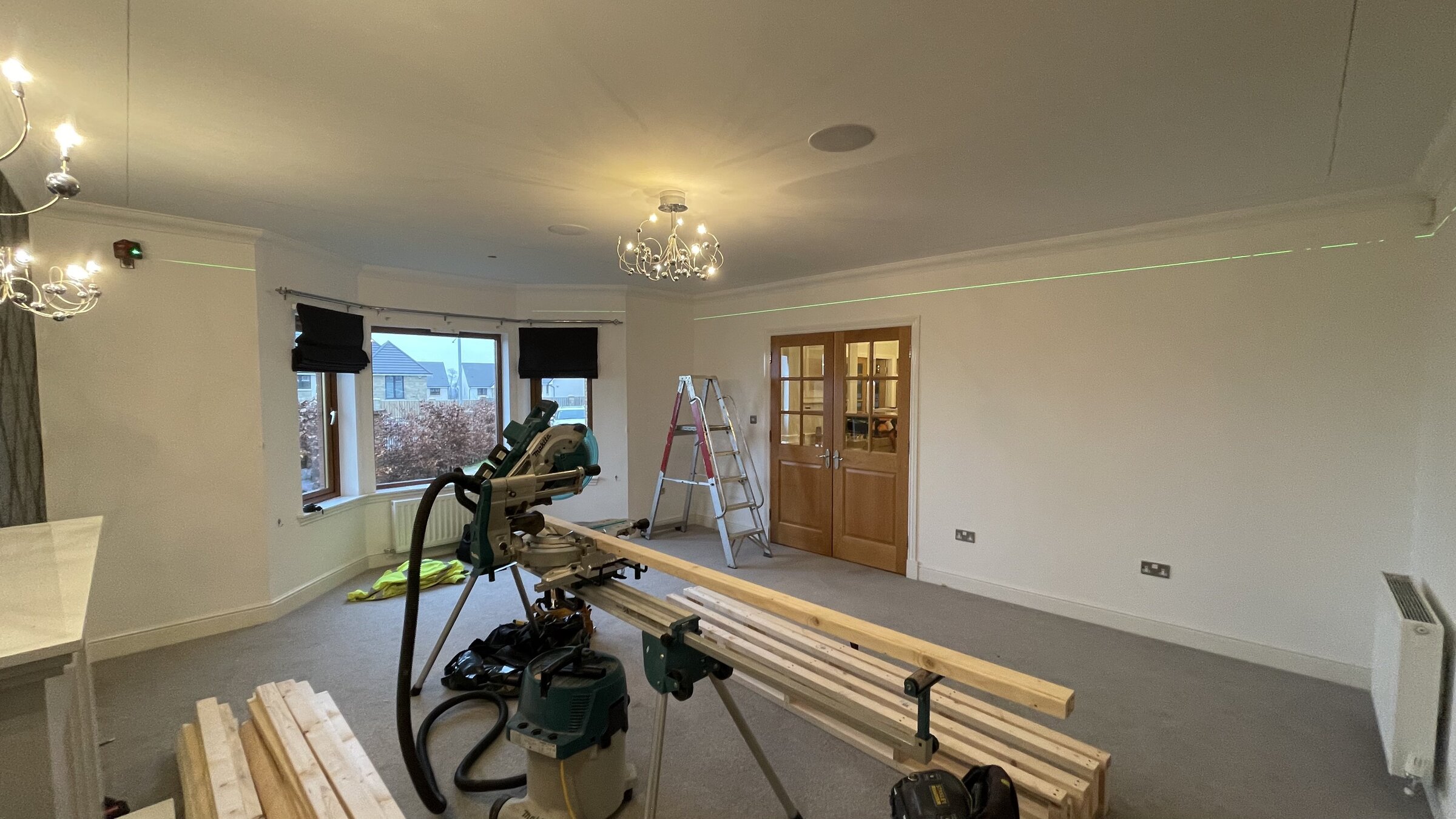 Dining room mid-renovation before cinema conversion, joinery in progress