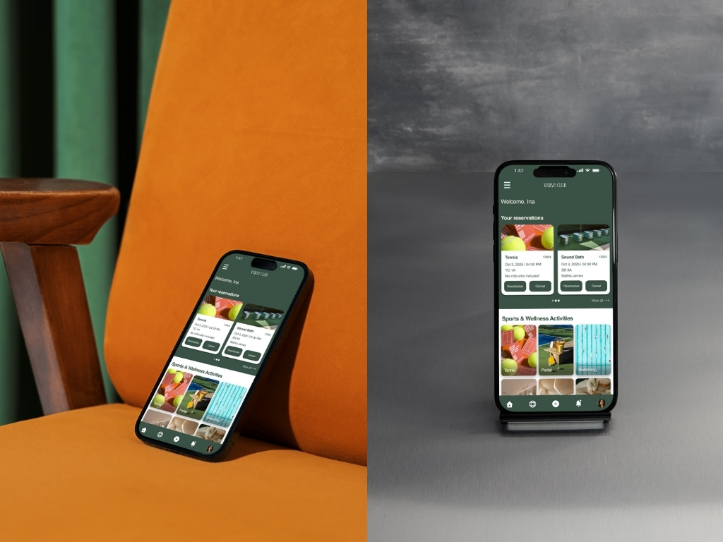 Smartphone displaying a sports and wellness booking app, shown resting on an orange chair and on a gray surface.