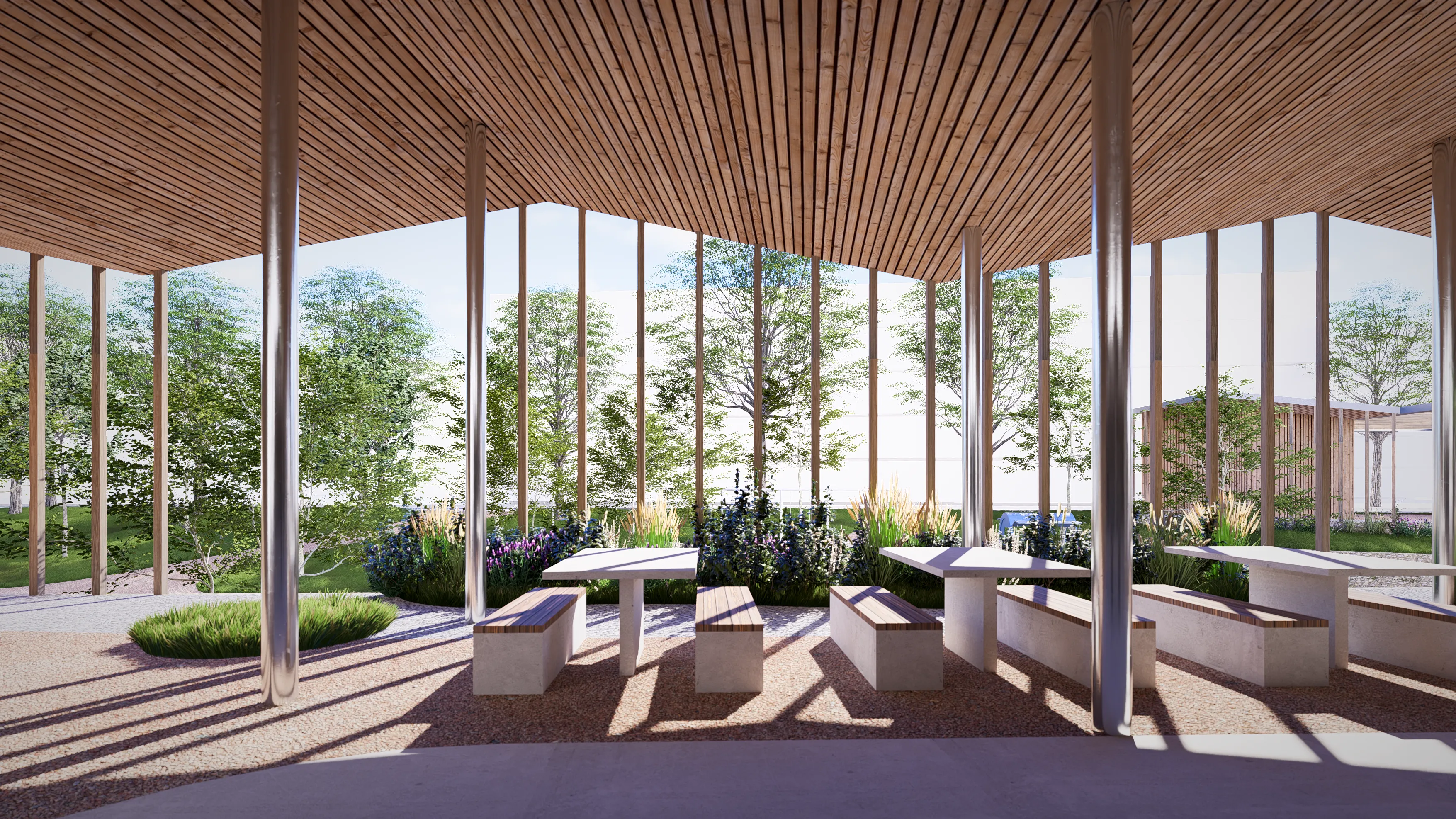 Modern three-story building with wooden slat facade, balconies, outdoor staircase, bikes parked, and surrounding greenery.