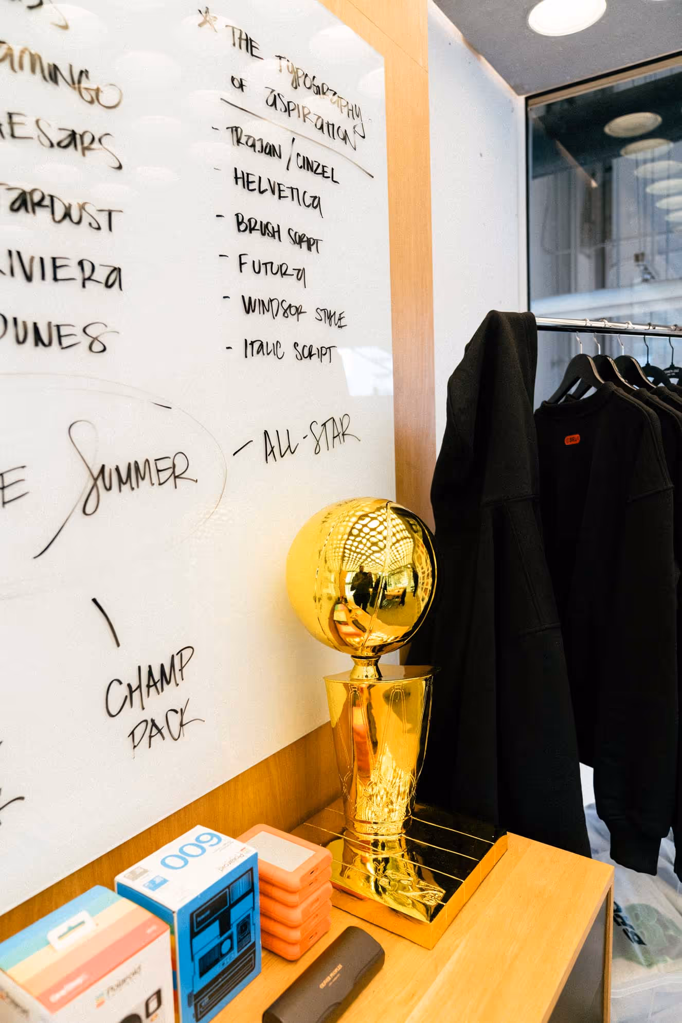 Inside the Brodie Rec League headquarters — league memorabilia, branded gear, and basketball culture on display