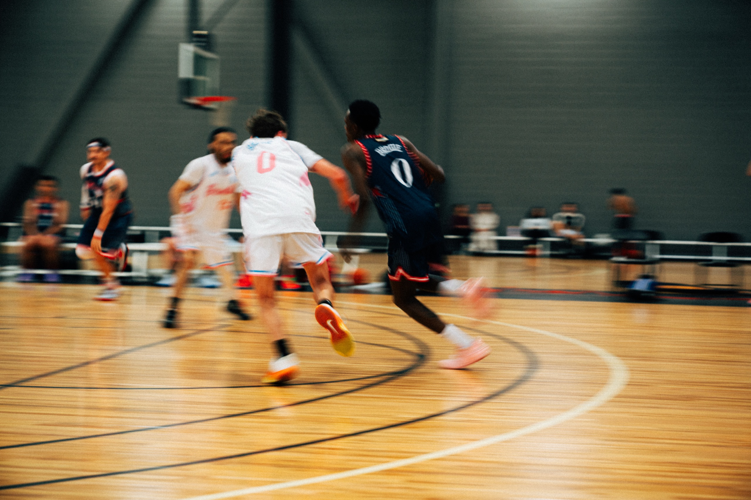 Athletes competing in a Brodie Rec. League basketball game