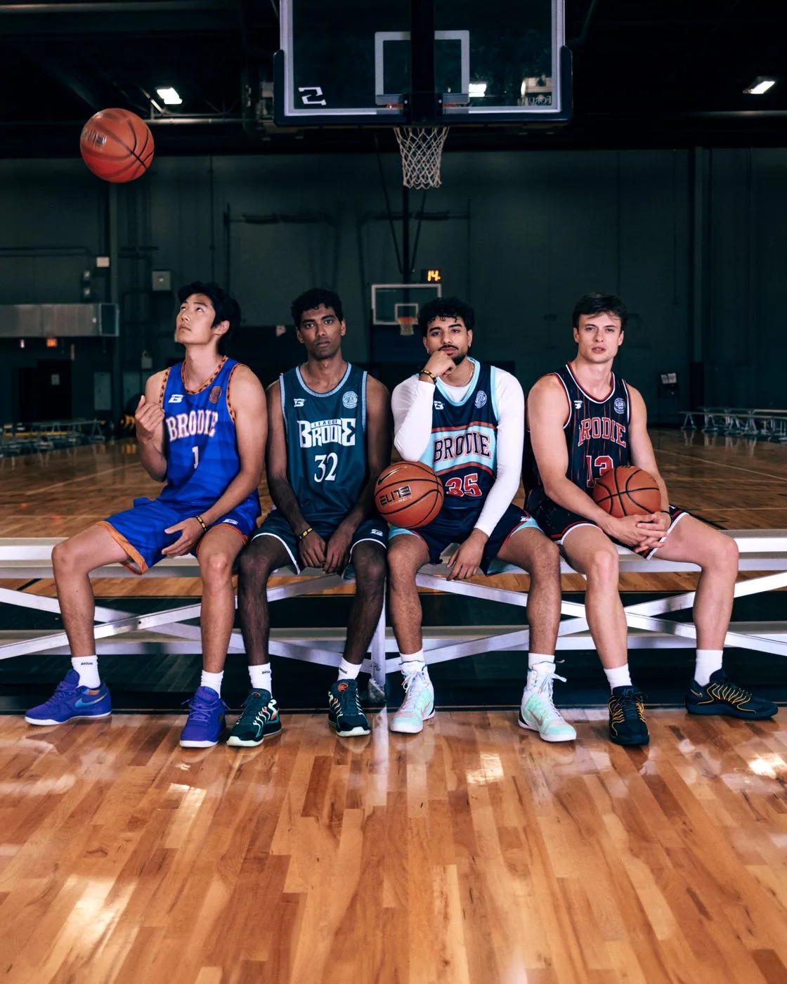 Brodie athletes sitting together on the bench